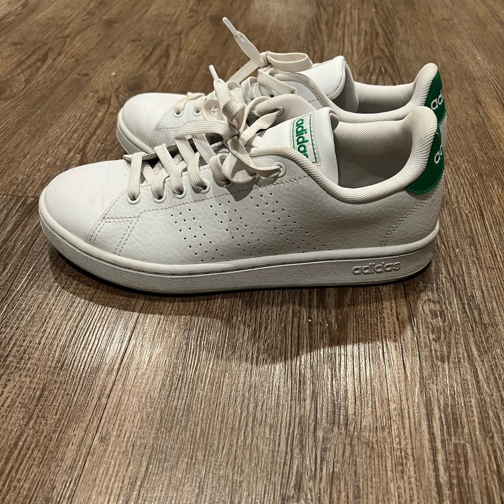Women’s adidas white sneaker with green accents in size: 9